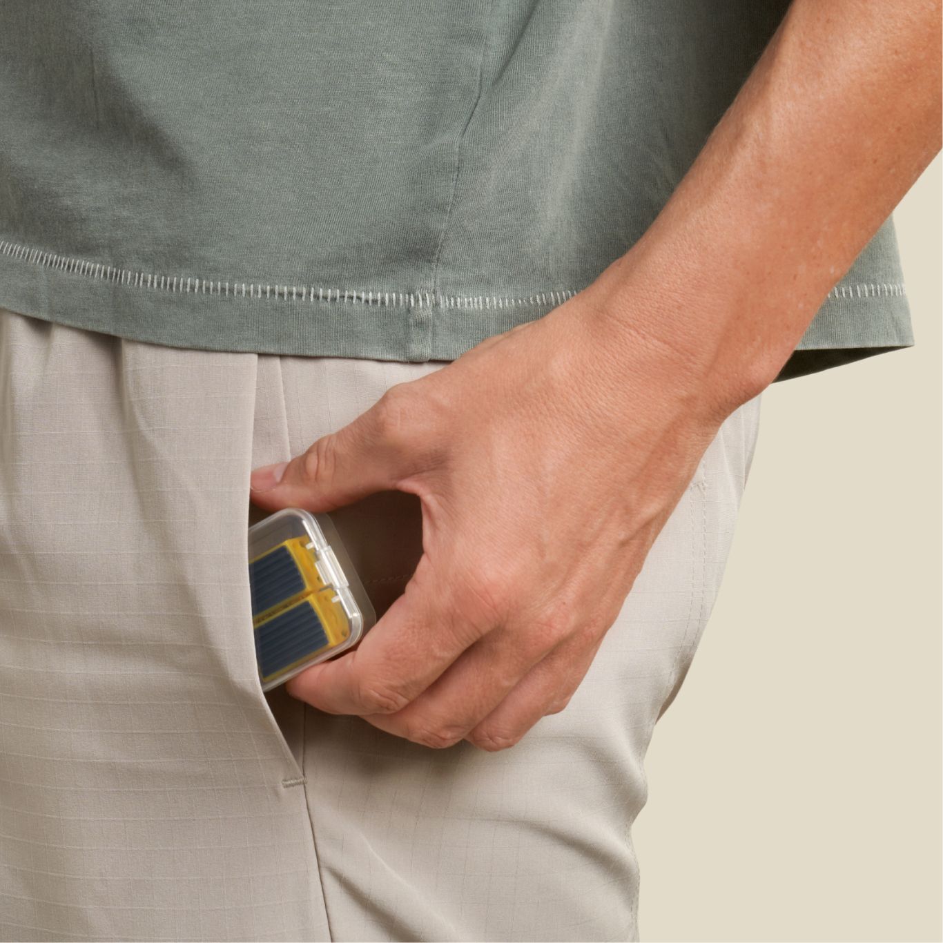 man easily slipping in his jawline core pair to his pocket