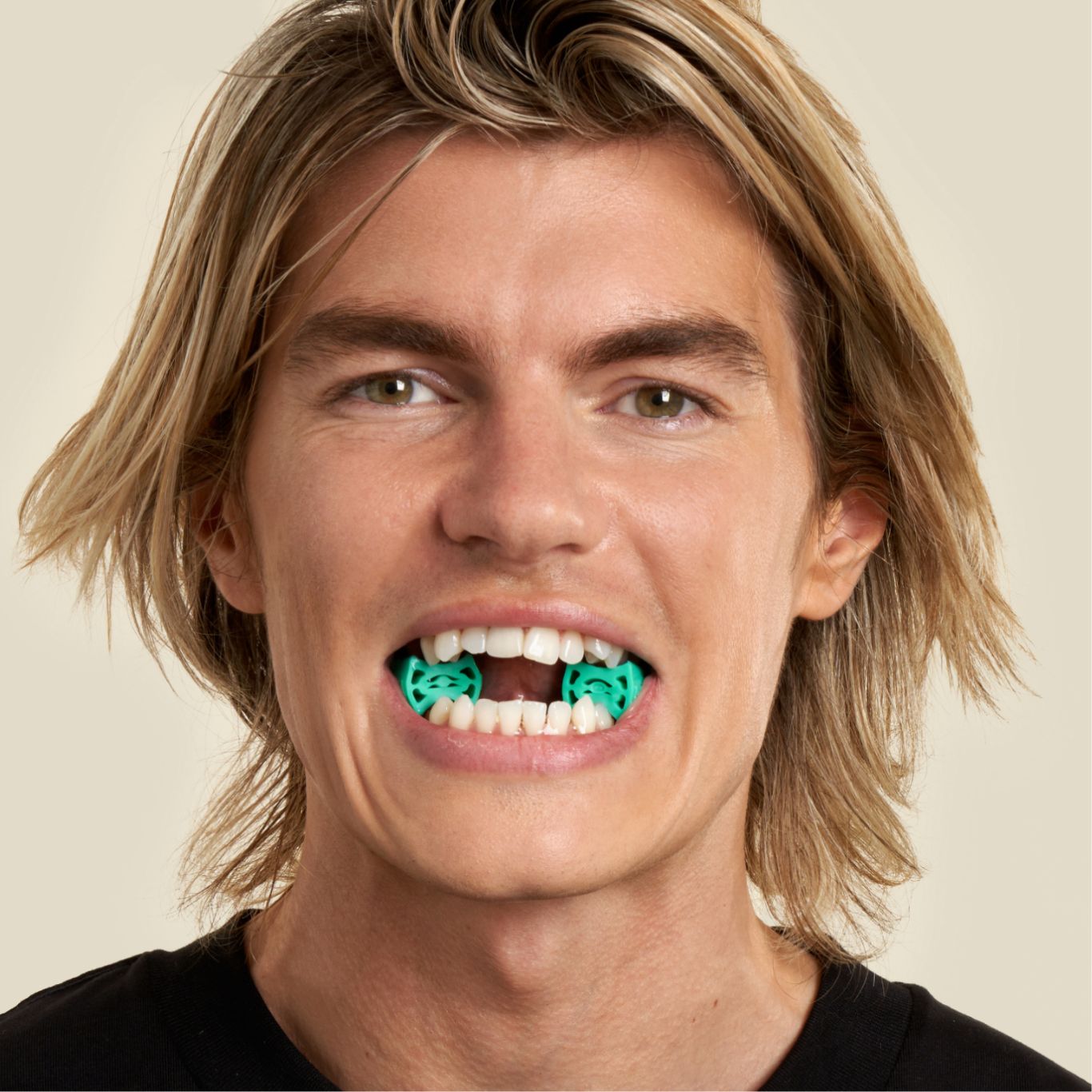 man doing jaw exercises with jawline core level 3