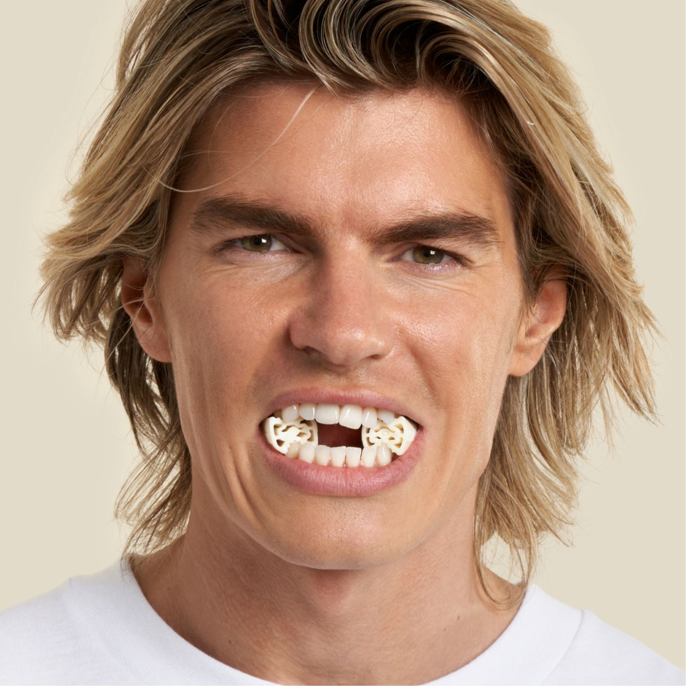 Man doing jaw exercises with jawline elite level 1