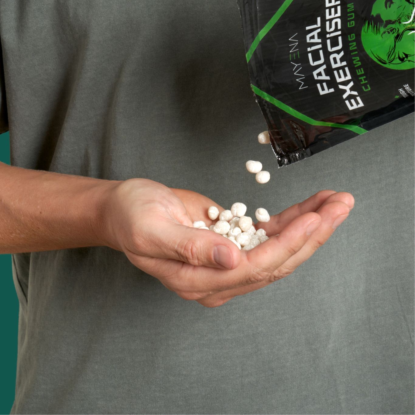 man pouring mayena facial exerciser gum to his hand