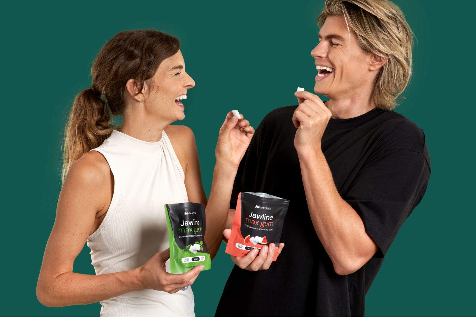 Two people with defined faces holding Mayena Jawline max gum product and packaging